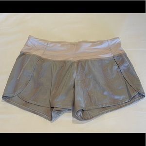 Lululemon low-rise, lines running shorts.